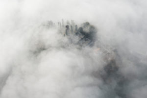Veneto mystically in the fog, aerial picture, cemetery, ground fog, Bassano, Italy Veneto mystically in the fog, aerial picture, cemetery, ground fog, Bassano, Italy